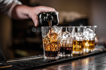 Bartender pouring alcoholic drink