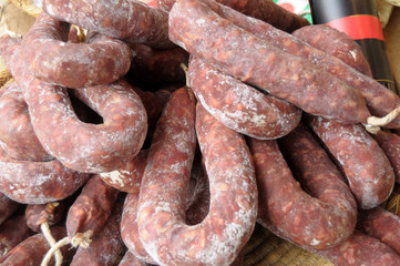 Salami exposed in a gastronomic festival in the village of Iseo in the province of Brescia - Italy 082