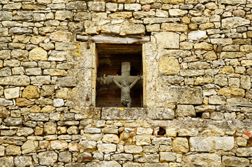 Fototapeta na wymiar Old crucifix in medieval window.