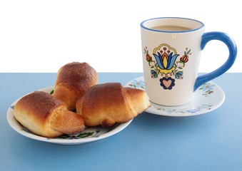 sweet buns with jam and coffee for breakfast