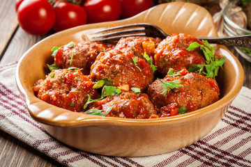 Pork meatballs with spicy tomato sauce in dish