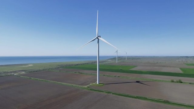 Wind power turbines in the field. Aerial view