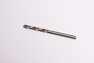 One drill for a drill isolated on white background. View from above. Close-up photo