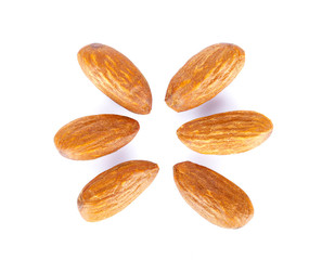 Almond seeds on white background