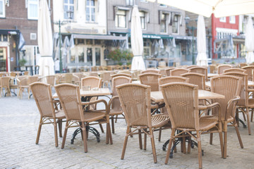 Tables in a cafe on the square of Bergen op Zoom in Holland. Travel in Europe. Netherlands