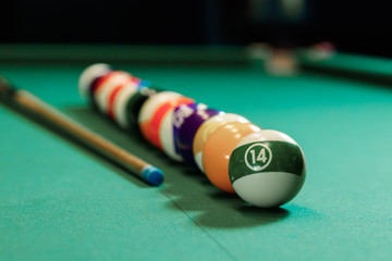 Billiard balls are lined up on a billiard table, American billiards. Sports games, outdoor...