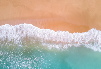 Aerial view of tropical sandy beach and ocean.