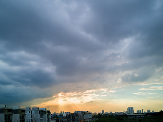 Urban skyline with cloudy sky