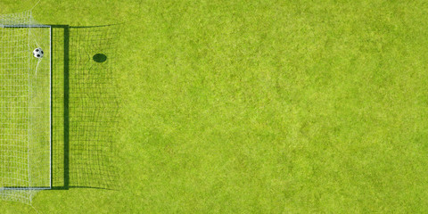 Fußball geht ins Tor von oben als Hintergrund © Robert Kneschke
