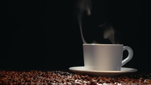 coffe cup with roasted beans