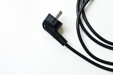 Electric cord with plug on white background.