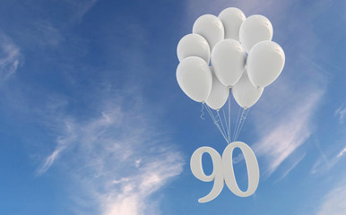Number 90 party celebration. Number attached to a bunch of white balloons against blue sky