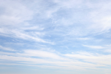 Blue sky with cirrus clouds.