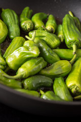 Green Padron Peppers Preparation in the Frying Pan