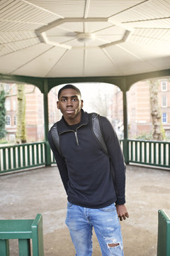 Portrait of a male student in a city