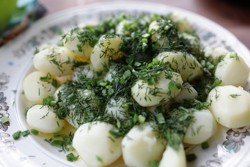 Boiled potatoes with melted butter