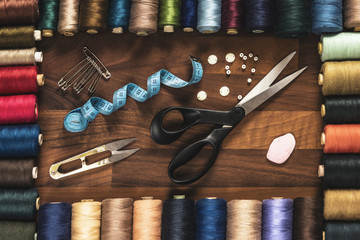 sewing tools on the wooden table