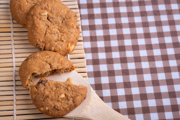cookie grains on bamboo wooden spoon