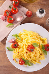 tagliatelle with baked tomato and egg