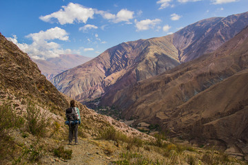 View of Iruya village and multicolored mountains in the surroundings at sunset, Salta province, Argentina, iruya - San Isidro - San Juan treeking