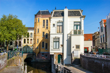 Obraz premium Cityscape with moat and monumental houses. Gouda, the Netherlands.
