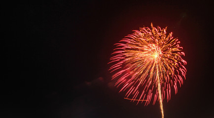 colorful fireworks on the black sky background over-water