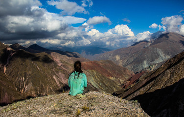 View of Iruya village and multicolored mountains in the surroundings at sunset, Salta province, Argentina, iruya - San Isidro - San Juan treeking