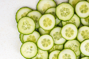 Spring fresh cucumber slices, top view