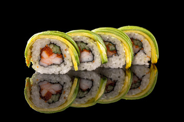 sushi rolls isolated on the black background