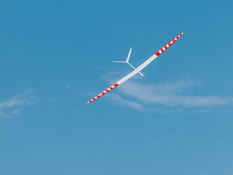 RC Soaring Plane On Blue Sky