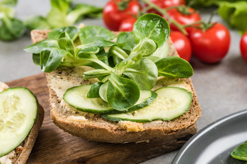 Bun with hummus and salad