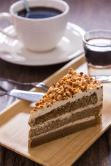 delicious baked dessert : slice coffee cake with whip cream and almond topping