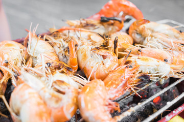 Grilled shrimps on the flaming grill,seafood.