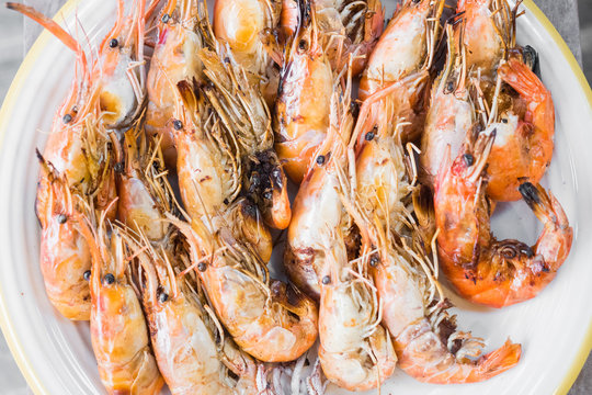 Grilled shrimps on white dish,seafood.