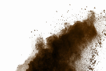 Explosion of brown dust on white background.
