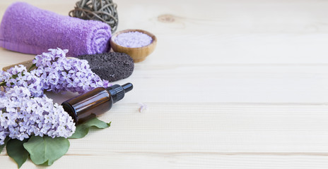 Spa setting with lilac and body products