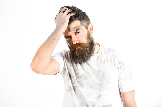 Man With Beard In Dirty Dusty Shirt Looks Exhausted.