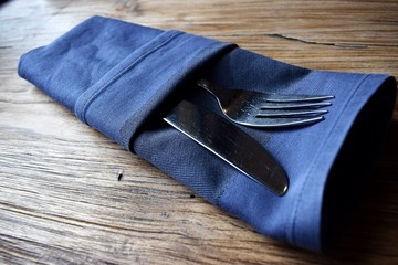 cutlery wrapped in a napkin