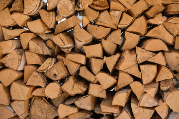 birch wood for the fireplace.wooden background