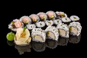 sushi rolls isolated on the black background