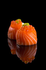 sushi on the black background