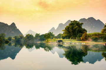 Sunset over a lake in Guangxi province of China