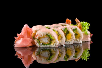 sushi rolls isolated on the black background