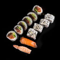 sushi on the black background