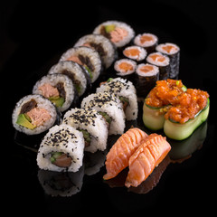 sushi on the black background