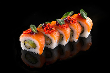 sushi set isolated on the black background