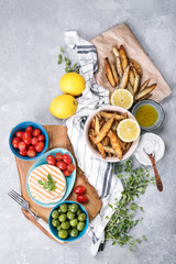 Fried anchovies with halloumi