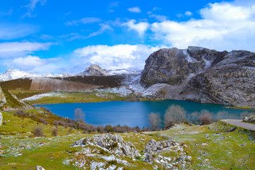 Enol Lake in Picos de Europa, Asturias, Spain. Beautiful view of a blue and clear lake in middle of mountains