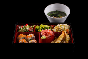 sushi lunch set isolated on the black background