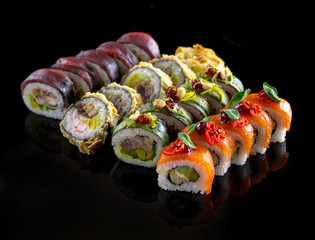 sushi on the black background